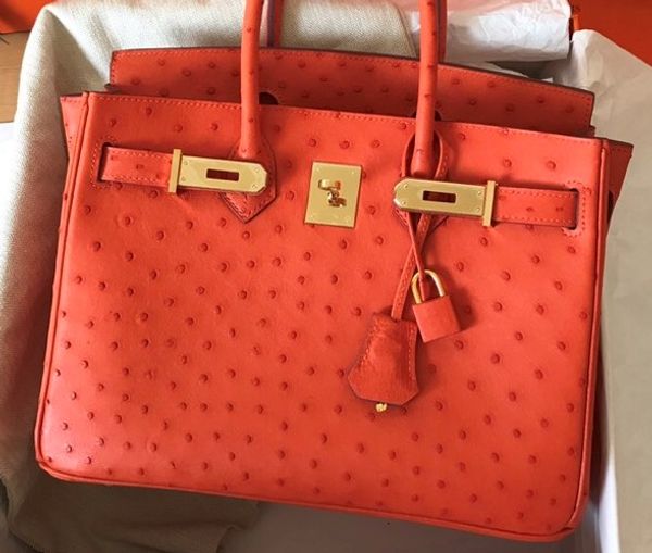 original design handmade wax thread orange ostrich handbag,gold,silver hardware,25 30 35cm for chosen,by machine,fast delivery
original design handmade wax thread orange ostrich handbag,gold,silver hardware,25 30 35cm for chosen,by machine,fast delivery