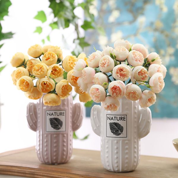27heads artificial fake camellia rose bouquet silk flower wedding party home diy 2019 selling dropshipping household family
27heads artificial fake camellia rose bouquet silk flower wedding party home diy 2019 selling dropshipping household family