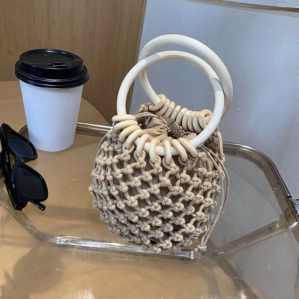 новый французский дизайн моды тканые сумки элегантный полые bucket bag ширина 10см высота 14см толщина 2 см
новый французский дизайн моды тканые сумки элегантный полые bucket bag ширина 10см высота 14см толщина 2 см