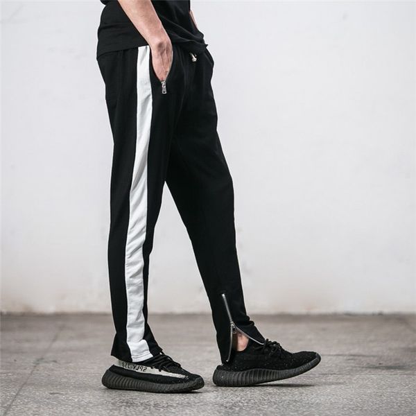 mens single stripe retro sports pants fashion solid color loose male casual zipper beam pants, Black
mens single stripe retro sports pants fashion solid color loose male casual zipper beam pants, Black