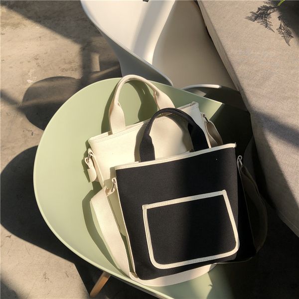 new women's casual shoulder bag simple wild portable diagonal capacity pouch travel beach bag canvas messenger handbag female 
new women's casual shoulder bag simple wild portable diagonal capacity pouch travel beach bag canvas messenger handbag female