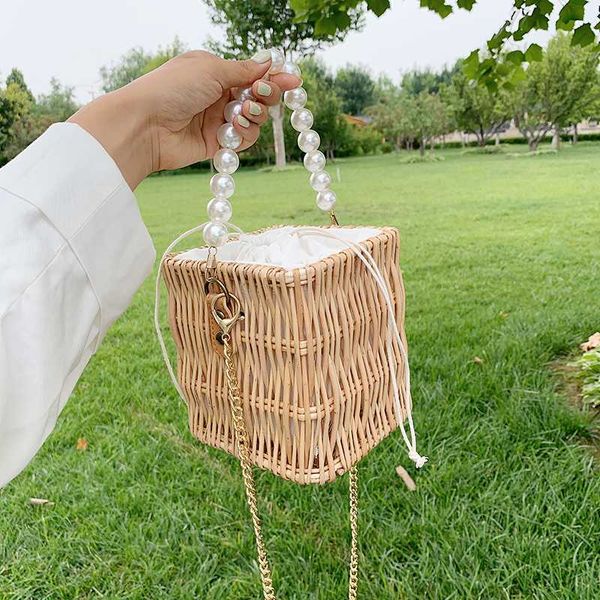 straw square box tote bag 2020 new style pearl women designer portable messenger bag all-match i chain shoulder
straw square box tote bag 2020 new style pearl women designer portable messenger bag all-match i chain shoulder