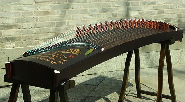 professional 21 stringed chinese zither phoebe wood guzheng white pine solid wood letters engraved gu zheng zither
professional 21 stringed chinese zither phoebe wood guzheng white pine solid wood letters engraved gu zheng zither