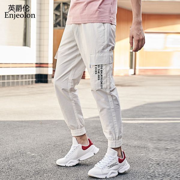 enjeolon новое лето длинные повседневные брюки мужчины sweatpants для мужчин большой карман грузовой joggers письмо вышивки брюки streetwear, Black
enjeolon новое лето длинные повседневные брюки мужчины sweatpants для мужчин большой карман грузовой joggers письмо вышивки брюки streetwear, Black