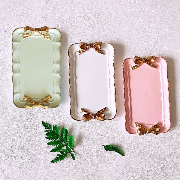 european style bow cake storage trays makeup organizer dessert plate square decor tray kitchen storage trays 12x20cm
european style bow cake storage trays makeup organizer dessert plate square decor tray kitchen storage trays 12x20cm