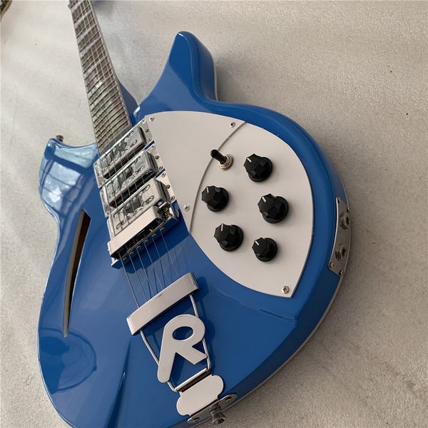 2 string electric guitar, ricken 360 guitar,metallic blue color body,rosewood fingerboard
2 string electric guitar, ricken 360 guitar,metallic blue color body,rosewood fingerboard