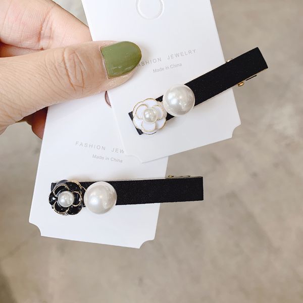 exquisite luxury camellia small hairpin girl student pearl hairpin headdress hair accessories
exquisite luxury camellia small hairpin girl student pearl hairpin headdress hair accessories