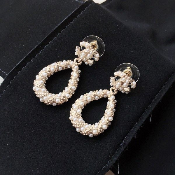 лучшие роскошные серьги дизайн pearl серьги латунь материал 925 иглы серьги серебро женщина ювелирной моды поставки, Golden
лучшие роскошные серьги дизайн pearl серьги латунь материал 925 иглы серьги серебро женщина ювелирной моды поставки, Golden