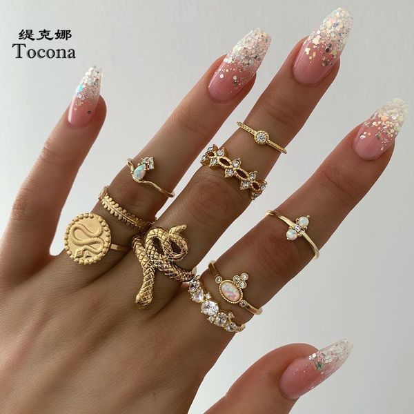 tocona new fashion luxurious gold color finger rings sets hollow round geometric hard crystal stone snake jewelry for women 7054, Golden;silver
tocona new fashion luxurious gold color finger rings sets hollow round geometric hard crystal stone snake jewelry for women 7054, Golden;silver