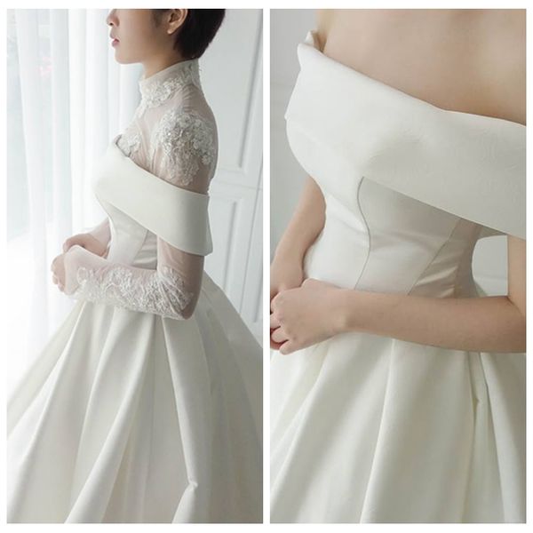 stunning wedding gowns high neck white convertible wedding dress with court train lace applique long sleeved wedding dresses robe de soiree
stunning wedding gowns high neck white convertible wedding dress with court train lace applique long sleeved wedding dresses robe de soiree