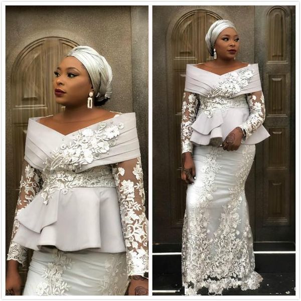 2020 new arabic dubai silver mermaid evening dresses off shoulder lace appliques peplum long sleeves plus size celebrity party prom gowns, Black;red
2020 new arabic dubai silver mermaid evening dresses off shoulder lace appliques peplum long sleeves plus size celebrity party prom gowns, Black;red