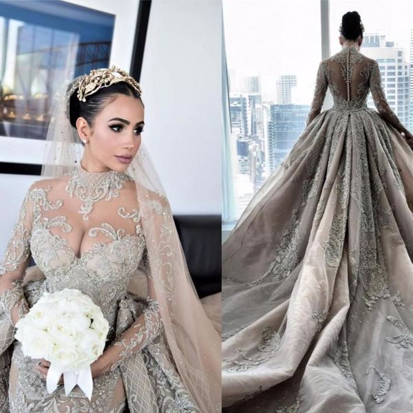 роскошные хрустальные бисером русалка свадебные платья с overskirt поезд sexy длинные рукава арабский mulslim церкви bling свадебные платья, White
роскошные хрустальные бисером русалка свадебные платья с overskirt поезд sexy длинные рукава арабский mulslim церкви bling свадебные платья, White
