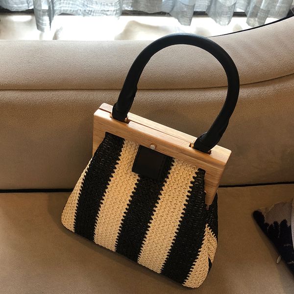 тканых соломы сумки мода деревянного клип женщины сумка кошелек rattan плечо сумка lady summer travel beach sac
тканых соломы сумки мода деревянного клип женщины сумка кошелек rattan плечо сумка lady summer travel beach sac