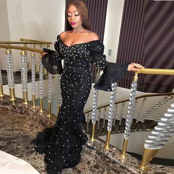 aso ebi african style black mermaid prom dresses off shoulder long poet sleeve crystal beaded formal evening gowns floor length party dress
aso ebi african style black mermaid prom dresses off shoulder long poet sleeve crystal beaded formal evening gowns floor length party dress