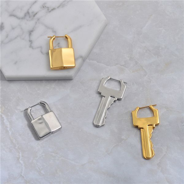 european and american niche design brass keys and lock earrings female punk neutral metal cold air ear buckle earrings, Silver
european and american niche design brass keys and lock earrings female punk neutral metal cold air ear buckle earrings, Silver