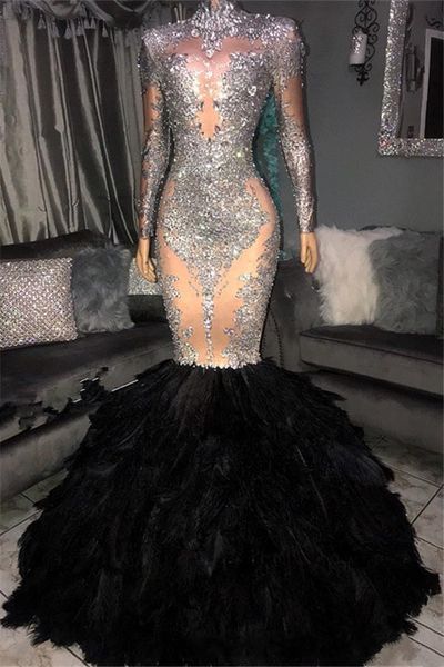Illusion Mermaid Prom Dresses 2019 Sheer Long Sleeves High Neck Lace Applique Beaded Feather Floor Length Formal Party Evening Gowns
Illusion Mermaid Prom Dresses 2019 Sheer Long Sleeves High Neck Lace Applique Beaded Feather Floor Length Formal Party Evening Gowns