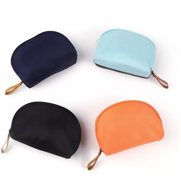 путешествия мини cosmetic bag 2020 новый водонепроницаемый нейлон молния shell shaped сцепления кошелек высокого качества твердая макияж сум
путешествия мини cosmetic bag 2020 новый водонепроницаемый нейлон молния shell shaped сцепления кошелек высокого качества твердая макияж сум