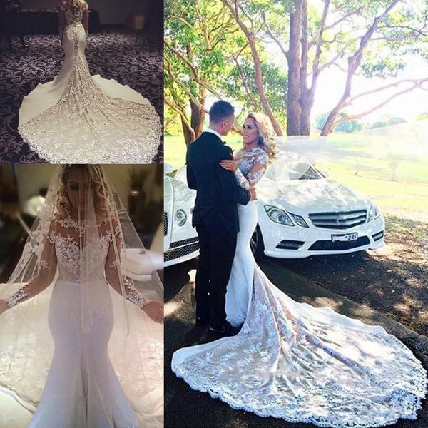 New Arrivals Sexy Long Sleeves Wedding Dresses Lace Appliques Court Train Mermaid Wedding Gowns Covered Button African Vintage Bridal Dress
New Arrivals Sexy Long Sleeves Wedding Dresses Lace Appliques Court Train Mermaid Wedding Gowns Covered Button African Vintage Bridal Dress