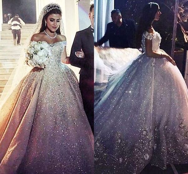 2019 luxury ivory sparkly crystals wedding dresses off shoulders lace flowers beaded wedding bridal gowns long tulle chapel train, White 
2019 luxury ivory sparkly crystals wedding dresses off shoulders lace flowers beaded wedding bridal gowns long tulle chapel train, White