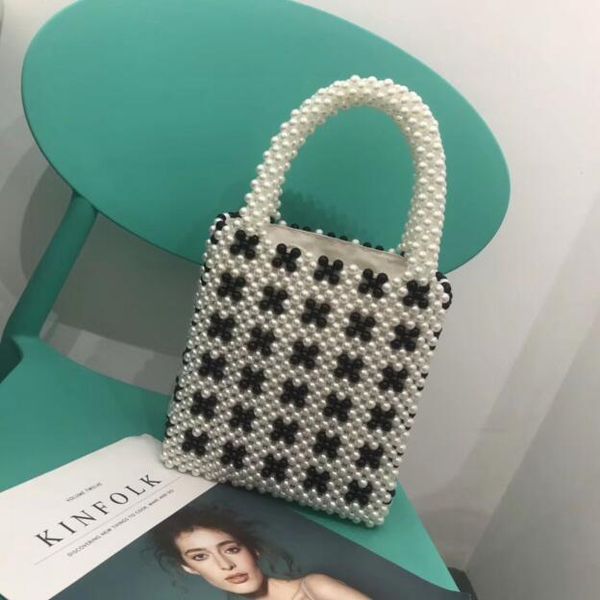 2019 fashion bags new fashion hand-woven pearl handbag, exquisite workmanship, fashion and beautiful size 20*20.5cm
2019 fashion bags new fashion hand-woven pearl handbag, exquisite workmanship, fashion and beautiful size 20*20.5cm