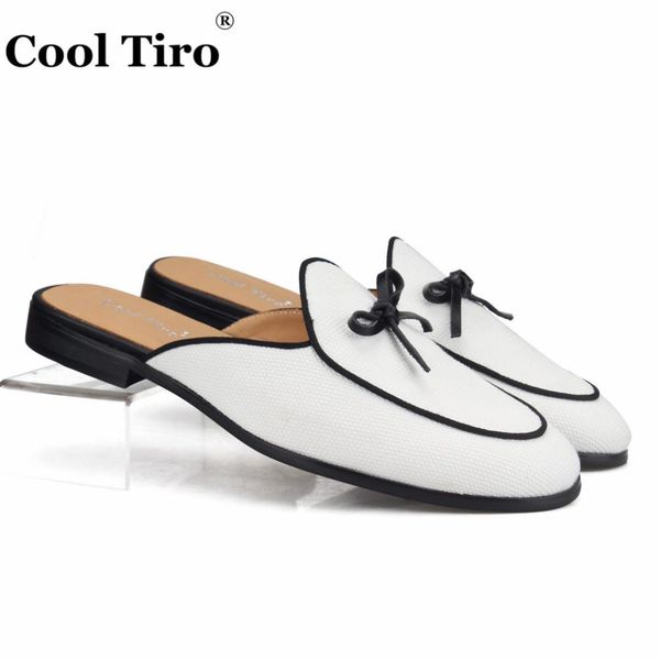 cool tiro white canvas mules men's slippers with bow sabot handmade casual shoes man flats real genuine leather plus size us13, Blue;gray
cool tiro white canvas mules men's slippers with bow sabot handmade casual shoes man flats real genuine leather plus size us13, Blue;gray