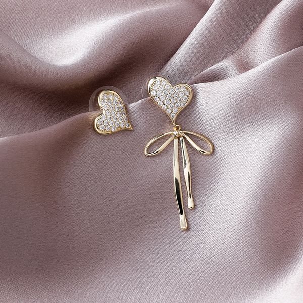 new arrive fashion jewellery asymmetric love bow elegant earrings for lady trendy style shiny crystal stud earring female, Silver
new arrive fashion jewellery asymmetric love bow elegant earrings for lady trendy style shiny crystal stud earring female, Silver