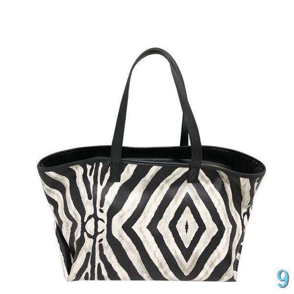 designer handbag zebra pattern portable new women's bag in large capacity travel single shoulder fashion versatile tote bag
designer handbag zebra pattern portable new women's bag in large capacity travel single shoulder fashion versatile tote bag