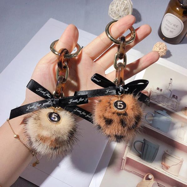 famous .5 chains mink pompom with ribbon key chain charms trinket bags car ring for girl gift pendant chains, Silver
famous .5 chains mink pompom with ribbon key chain charms trinket bags car ring for girl gift pendant chains, Silver