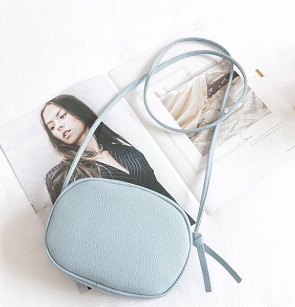 summer early autumn style simple solid color cute round zipper shoulder bag messenger small bag simple pu leather
summer early autumn style simple solid color cute round zipper shoulder bag messenger small bag simple pu leather