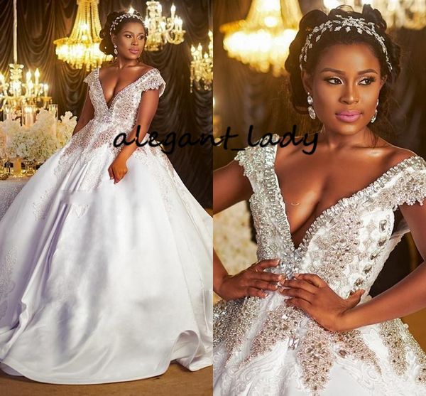 luxurious crystal wedding dresses deep v neck lace appliques beads capped african draped skirt dubai bridal dress wedding gowns, White
luxurious crystal wedding dresses deep v neck lace appliques beads capped african draped skirt dubai bridal dress wedding gowns, White