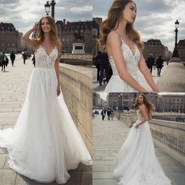 bohemian wedding dresses spaghetti straps lace appliqued beads flowing flare bridal gowns backless beach a-line wedding dress, White
bohemian wedding dresses spaghetti straps lace appliqued beads flowing flare bridal gowns backless beach a-line wedding dress, White