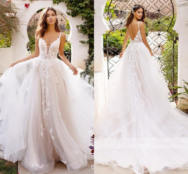 роскошные пляжные аппликации иллюзия назад свадебное платье boho новые ремни спагетти спинки глубокий v-образным вырезом кружевные свадебные, White
роскошные пляжные аппликации иллюзия назад свадебное платье boho новые ремни спагетти спинки глубокий v-образным вырезом кружевные свадебные, White