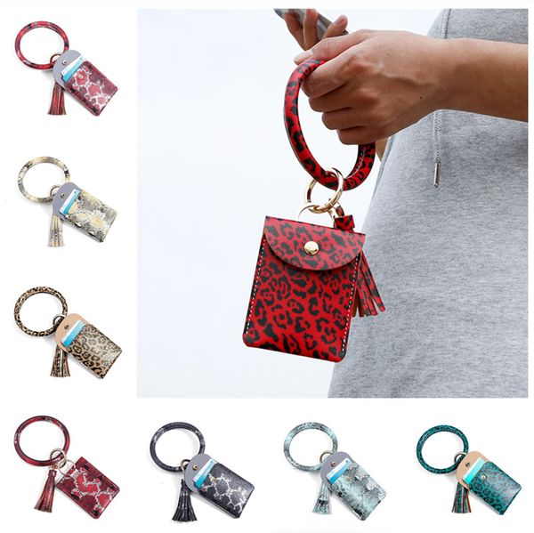 15 colors women wallet coin purses tassels key ring card holder bag leopard pu leather bracelets snake print bag wristlets bangle e22909, White
15 colors women wallet coin purses tassels key ring card holder bag leopard pu leather bracelets snake print bag wristlets bangle e22909, White