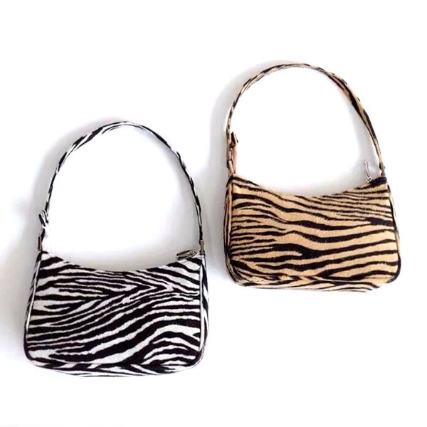 женщины сумка strip zebra сумки tote плечо сумка женская сумочка девушка bolsas моды lady бархатные сумки
женщины сумка strip zebra сумки tote плечо сумка женская сумочка девушка bolsas моды lady бархатные сумки