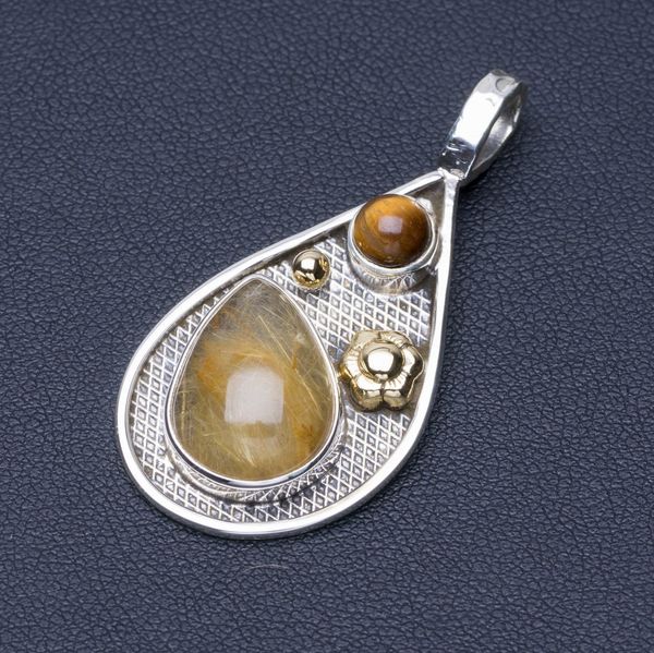 natural rutilated quartz and tiger eye punk style 925 sterling silver pendant 1 3/4" q0535
natural rutilated quartz and tiger eye punk style 925 sterling silver pendant 1 3/4" q0535