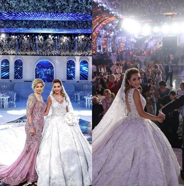 princess lace ball gown wedding dresses v neck backless bridal gowns cathedral train dubai saudi arabic beach wedding dress plus size, White
princess lace ball gown wedding dresses v neck backless bridal gowns cathedral train dubai saudi arabic beach wedding dress plus size, White