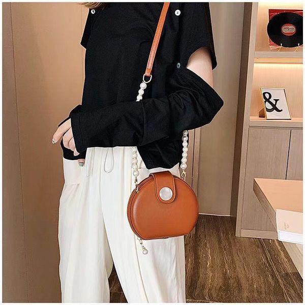 new solid color small crossbody bags for women circle bag with pearl fashion shoulder bag korean style pu leather
new solid color small crossbody bags for women circle bag with pearl fashion shoulder bag korean style pu leather