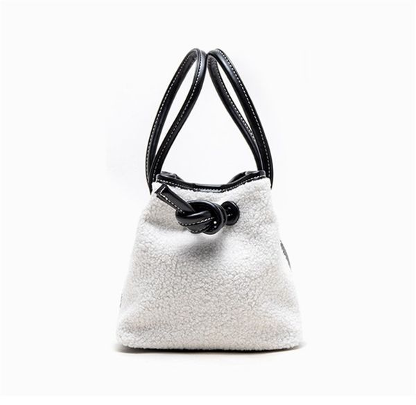 designer handbag autumn and winter design cloth drawstring button bucket bags thousand bird pattern simple lamb hair bag shoulder bags 1
designer handbag autumn and winter design cloth drawstring button bucket bags thousand bird pattern simple lamb hair bag shoulder bags 1