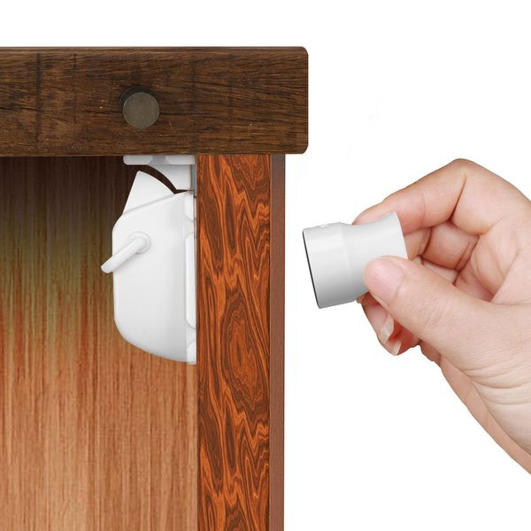 white plastic easy to install safety baby magnetic cabinet locks - no tools or screws needed (4 locks + 1 key
white plastic easy to install safety baby magnetic cabinet locks - no tools or screws needed (4 locks + 1 key