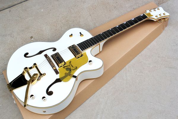 factory custom white body electric guitar with golden hardware,big tremolo bridge,body binding,can be customized
factory custom white body electric guitar with golden hardware,big tremolo bridge,body binding,can be customized