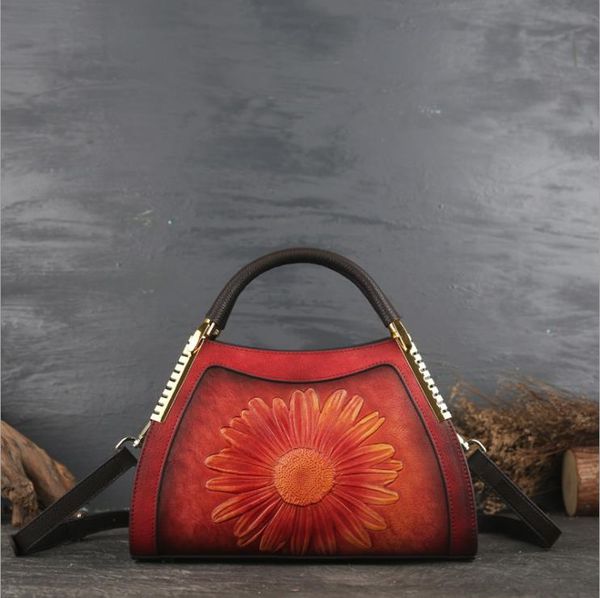 european and american new messenger bag female leather handbag fashion trendy head layer cowhide sun flower embossed retro casual ladies han
european and american new messenger bag female leather handbag fashion trendy head layer cowhide sun flower embossed retro casual ladies han