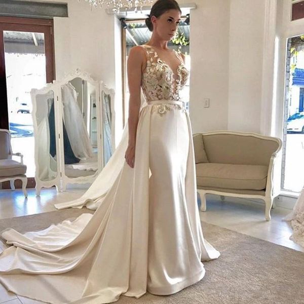 glamorous satin mermaid wedding dress with detachable overskirt sheer neck beads lace appliques bridal dress sleeveless wedding gowns, White
glamorous satin mermaid wedding dress with detachable overskirt sheer neck beads lace appliques bridal dress sleeveless wedding gowns, White