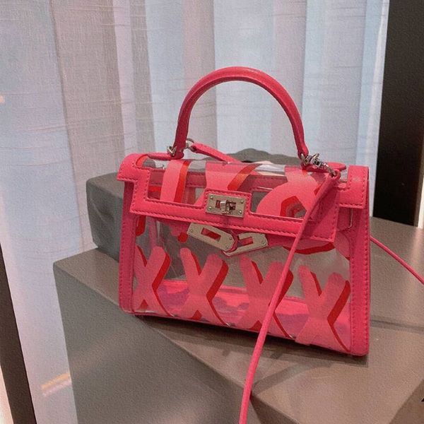 pvc transparent handbags letters print ladies stylish jelly shoulder bag cross bag 2020 new small totes designer
pvc transparent handbags letters print ladies stylish jelly shoulder bag cross bag 2020 new small totes designer