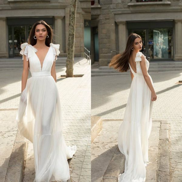 2020 bohemian bridal dresses v neck ruffle sleeveless wedding dress backless sweep train simple custom made robes de mariée, White
2020 bohemian bridal dresses v neck ruffle sleeveless wedding dress backless sweep train simple custom made robes de mariée, White