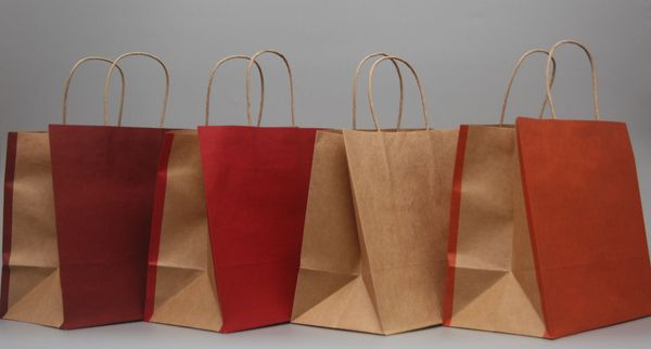 7 colors paper bags with haddle gift bag 100pcs/lot ing 
7 colors paper bags with haddle gift bag 100pcs/lot ing