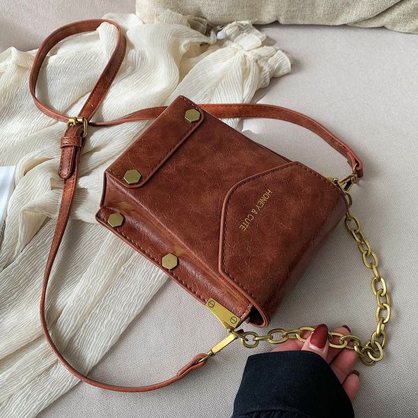 chain retro small bag women's new fashion texture single shoulder bag simple square box messenger handbag
chain retro small bag women's new fashion texture single shoulder bag simple square box messenger handbag