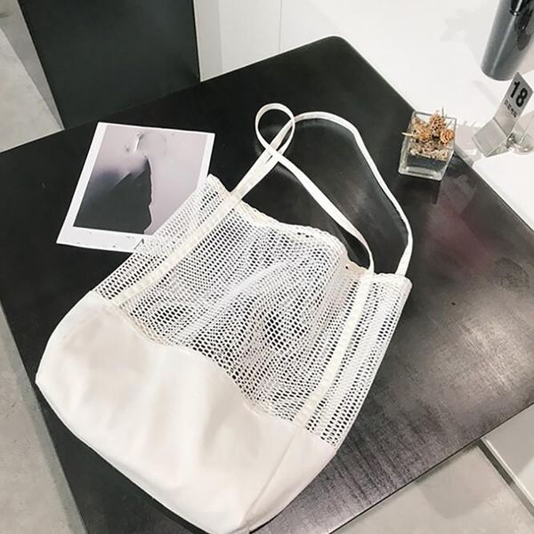 new korean grid handbag mesh hollow out sandy beach package canvas single shoulder woman bag
new korean grid handbag mesh hollow out sandy beach package canvas single shoulder woman bag