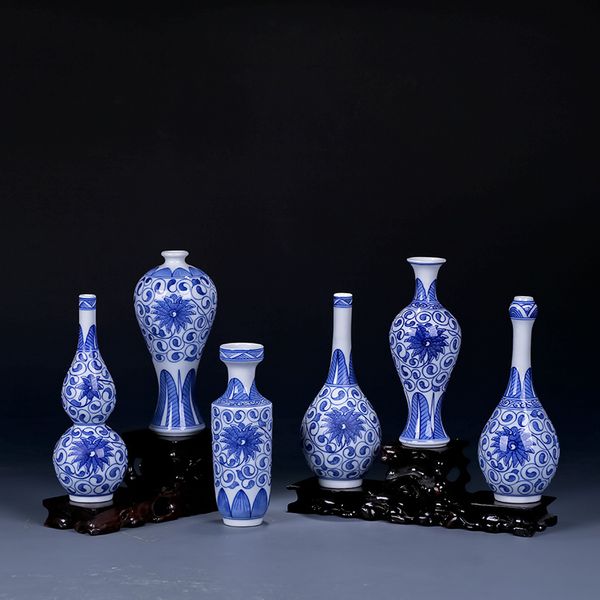 simple modern ceramic trumpet vase hand-painted blue and white porcelain household ornaments table ornaments flower vase
simple modern ceramic trumpet vase hand-painted blue and white porcelain household ornaments table ornaments flower vase