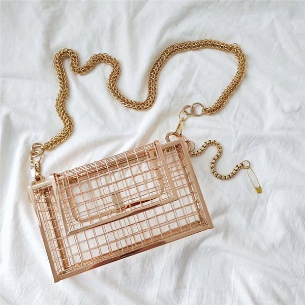 designer- hollow out clutch bag bird cage women handbag tote metal cage girls handle bags purse fashion party pouch evening bag
designer- hollow out clutch bag bird cage women handbag tote metal cage girls handle bags purse fashion party pouch evening bag