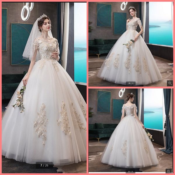 2020 new arrival white beaded ball gown wedding dress modest cap sleeve champagne lace appliques with flower bridal gowns selling
2020 new arrival white beaded ball gown wedding dress modest cap sleeve champagne lace appliques with flower bridal gowns selling